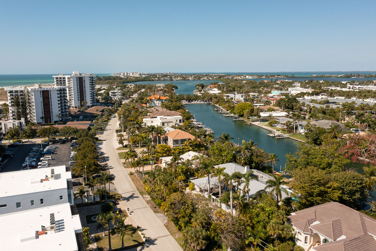 Mature palms and architecture within an established Florida landscape