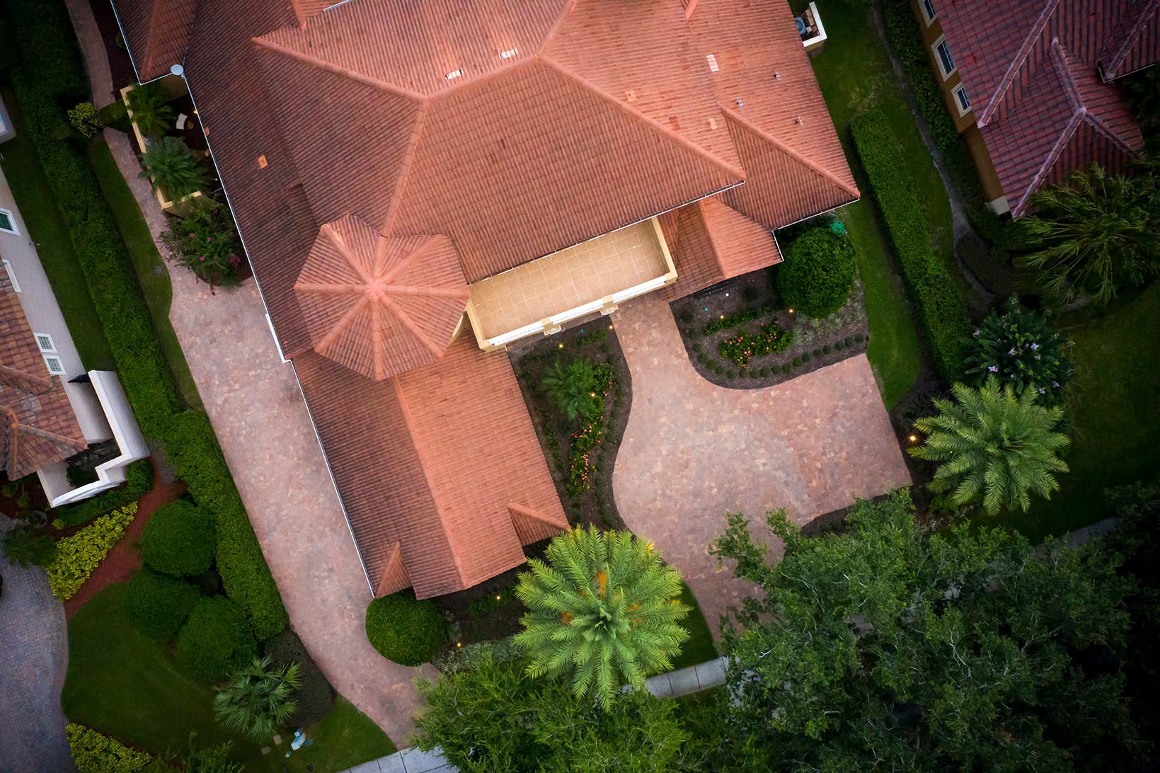 An aerial view of a Florida home and its surrounding landscape composition
